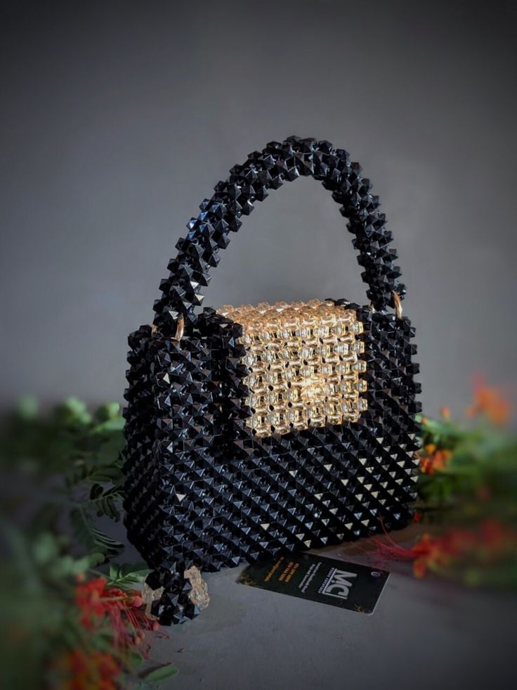 "This one is called 'Paris' This Medium sized  bag is sure to elevate your style. Be it a dinner party, a wedding or a night out with the girls. Our bags are 💯 Handmade, carefully designed with quality materials. Perfectly compliments any outfit. Spacious enough to contain all your essntials. Makes a perfect gifts Since we have full control of producing and designing of our bags, we are ready to customize your bag to your preferred size, colour and style. Kindly message us by hitting on the \"m Beaded Top Handle Shoulder Bag For Evening, Beaded Top Handle Evening Shoulder Bag, Beaded Evening Shoulder Bag With Top Handle, Evening Beaded Top Handle Shoulder Bag, Luxury Handheld Beaded Shoulder Bag, Black Square Box Bag For Gifts, Evening Top Handle Bag With Beaded Details, Elegant Handmade Black Bag, Luxury Beaded Bags For Everyday Use