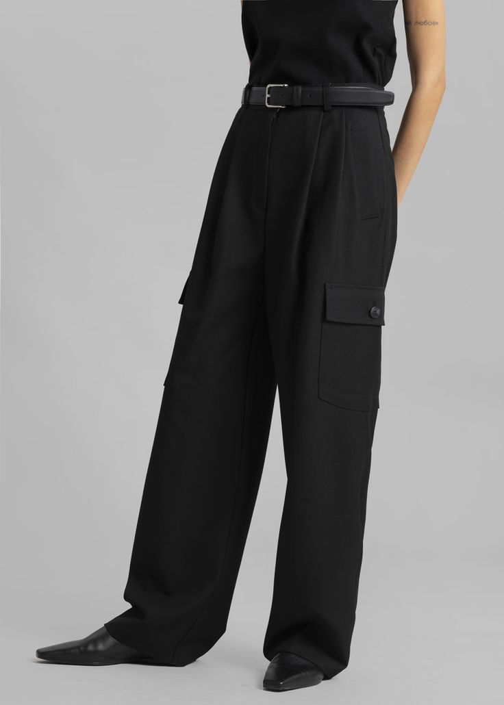 Color: Black Traditional suiting fabric with light stretch Tailored cargo style Pleat front detail Welt hip pockets Enlarged cargo pockets at the leg Unlined 77% Polyester 18% Rayon 5% Spandex Dry Clean By The Frankie Shop. Imported Product Measurements: XS - 24" Waist, 38" Hip, 13" Rise, 29" Inseam S - 26" Waist, 40" Hip, 13.5" Rise, 29.5" Inseam M - 28" Waist, 42" Hip, 14" Rise, 30" Inseam L - 30" Waist, 44" Hip, 14.5" Rise, 30.5" Inseam Model is 174cm/ 5'8" wearing size M Versatile Cargo Pants With Side Pockets For Work, Versatile Cargo Pants For Workwear, Workwear Cargo Pants With Multiple Pockets Ankle-length, Versatile Workwear Cargo Pants With Pockets, High Waisted Cargo Pants With Flap Pockets For Workwear, Fitted Cargo Jeans With Belt Loops For Work, Black Cargo Pants With Welt Pockets For Fall, Wide Leg Cargo Style Workwear Pants, High Waist Cargo Pants With Cargo Pockets For Work