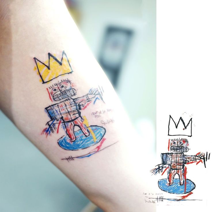 a drawing on the arm of a person with a tattoo that says king and queen