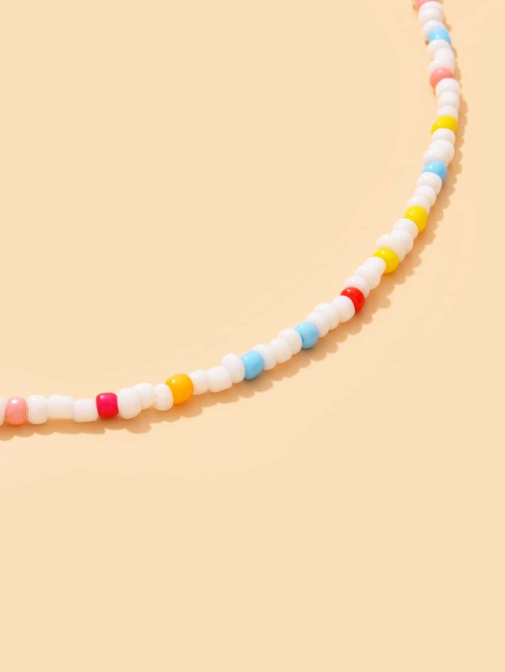 Color: Multicolor Gender: Women Material: Glass Quantity: 1 piece Style: Fashionable Details: Beaded Type: Beaded IN Length 16.9-18.9 This data was obtained from manually measuring the product, it may be off by 1-2 CM. Colorful Beaded Necklaces With Letter Beads, Casual White Beaded Bracelets, Colorful Letter Beads Necklace, Multicolor Beaded Plastic Necklace, Trendy Multicolor Beaded Necklaces With Heart Beads, Casual Multicolor Necklaces With Spacer Beads, Multicolor Plastic Beaded Jewelry, Trendy White Necklace With Spacer Beads, White Beaded Chain Necklace