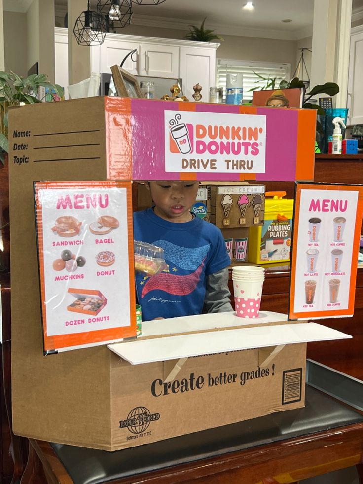 Dramatic play pretend play Dunkin drive thru cardboard Dramatic Play Bulletin Board Ideas, Dramatic Centre Ideas Preschool, Sandwich Shop Dramatic Play Free Printable, Dunkin Drive Thru, Dramatic Play Classroom Set Up, Dramatic Play Provocations, Simple Dramatic Play Ideas, Drive Thru Dramatic Play, Donut Dramatic Play