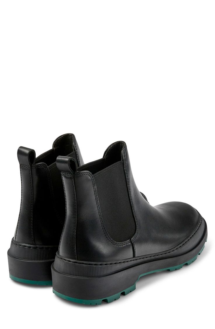 This adventure-ready Chelsea boot features a colorpop sole with chunky lugs for reliable grounding and a waterproof membrane to keep feet dry. Pull-on style with elastic gore insets Waterproof HYDROSHIELD® membrane Waterproof: protects against rain, puddles and slush to keep feet dry in wet conditions Removable OrthoLite® Eco™ insole Leather and textile upper/recycled-textile and leather lining/rubber and synthetic lining Imported Black Boots With Recycled Rubber Sole, Black Lug Sole Boots For Outdoor Work, Black Boots With Lug Sole For Outdoor Work, Black Combat Boots With Lug Sole For Outdoor Activities, Black Combat Boots With Lug Sole For Outdoor, Black Waterproof Boots Made Of Recycled Rubber, Black Waterproof Boots With Recycled Rubber, Black Work Boots With Lug Sole For Outdoor Activities, Black Work Boots With Lug Sole For Outdoor