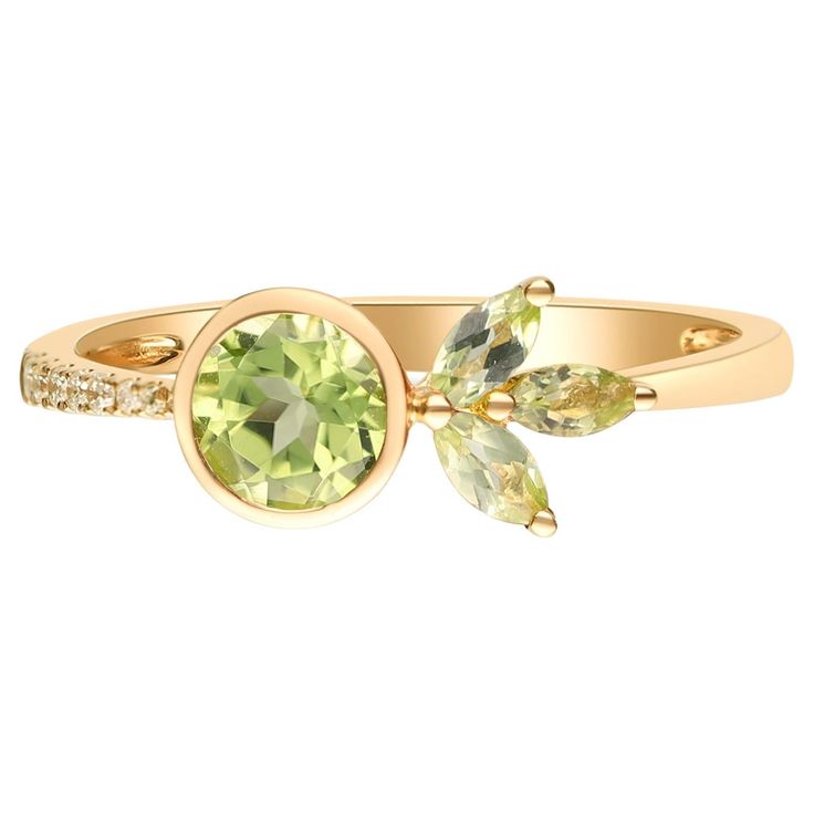 Stunning, timeless and classy eternity Unique Ring. Decorate yourself in luxury with this Gin & Grace Ring. The 14K Yellow Gold jewelry boasts with Round-Cut Peridot (1 pcs) 0.59 carat, Pear-cut Emerald (3pcs) 0.24 carat and Round Cut White Diamond (8pcs) 0.04 carat accent stones for a lovely design. This Ring is weight 1.98 grams. Crafted with 14K Yellow Gold, this delicate Ring is polished to a high finish shine. Gin And, Gold Ring For Women, Yellow Gold Jewelry, Unique Ring, Delicate Rings, Yellow Gold Ring, Ring For Women, Pear Cut, Yellow Gold Rings