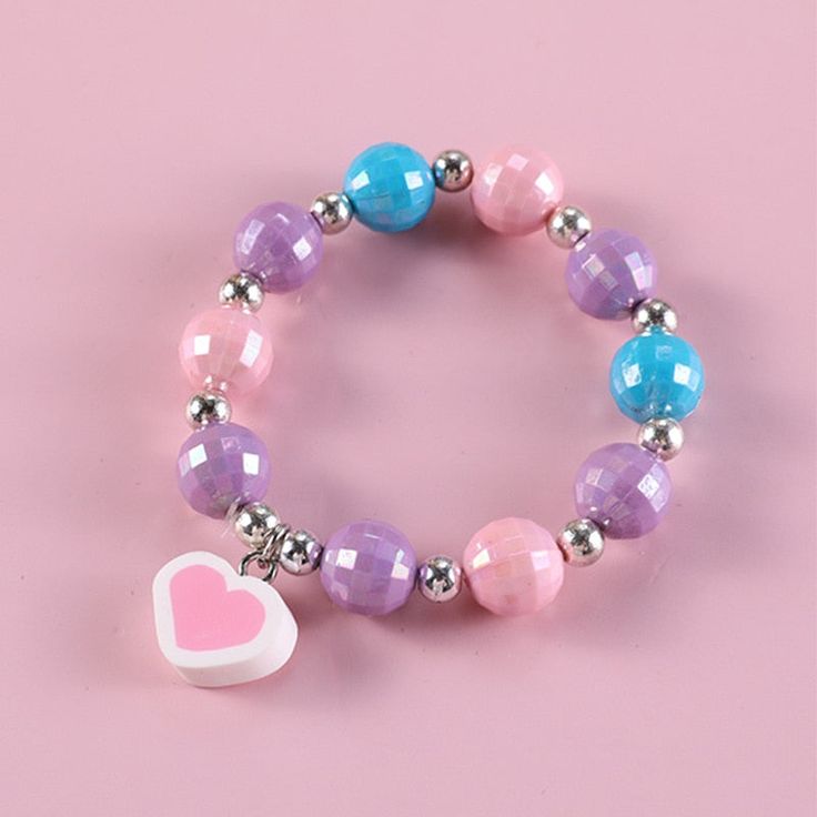 This cute unicorn set is the perfect gift for your little girl or grand child. Perfect for girls age 3 to 11 years old. Cute Purple Bracelets For Birthday, Trendy Purple Jewelry For Birthday, Cute Purple Beaded Bracelets For Birthday, Playful Purple Beaded Bracelets For Birthday, Adjustable Purple Charm Bracelet For Birthday, Trendy Purple Jewelry With Heart Beads, Adjustable Purple Jewelry For Birthday, Adjustable Purple Playful Necklace, Playful Adjustable Purple Necklace