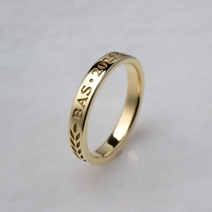 Have your degree or diploma abbreviation , graduation year and school letters cast right into a solid gold ring. For those who who would prefer a smaller ring to commemorate their graduation instead of the more common signet ring. Features of the ring:    -Font is Times New Roman   - Characters are cast into the ring to a depth 1/5 the thickness of the ring, making them easy to read   - The characters have a sandblasted finish. The rest of the ring is highly polished    -Band is 3mm wide and 1.5 Classic Engraved Ring Stamped 14k For Commemoration, Classic 14k Gold Engraved Ring For Commemoration, Classic Personalized Engraved Ring For Commemoration, Class Ring Ideas, Cute Class Rings, 14k Gold Engraved Ring With Hallmarks For Commemoration, Personalized Classic Engraved Ring For Commemoration, Personalized Gold Rings For Commemoration, Graduation Rings High School