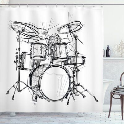 a shower curtain with a drum set drawn on it