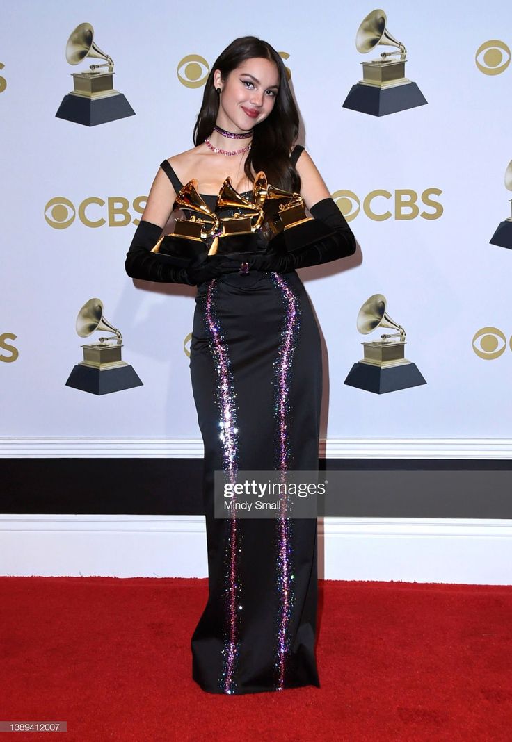 the singer poses in the press room at awards on sunday, feb 22, 2013