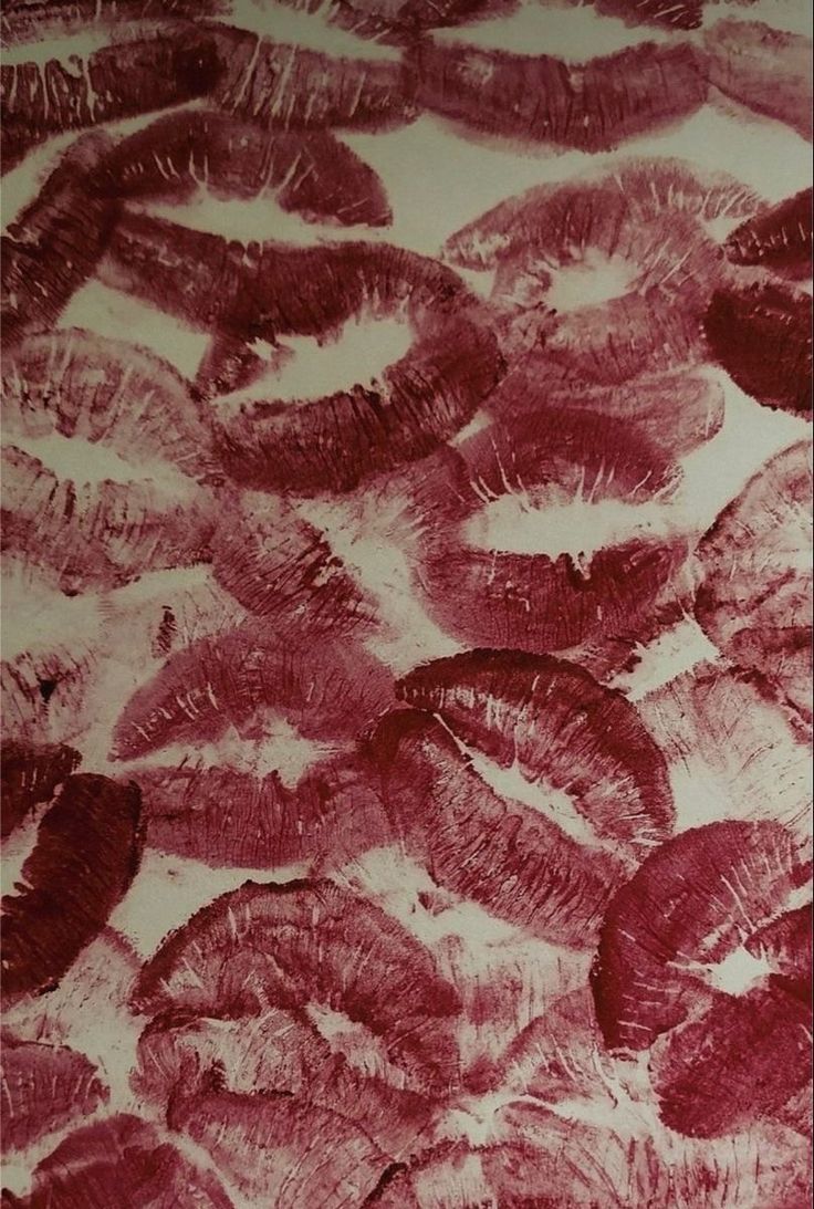 red and white drawing of leaves on paper