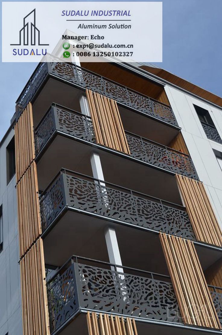 a tall building with balconies on the sides