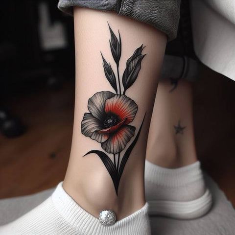 a woman's foot with a flower tattoo on her left ankle and the bottom part of her leg