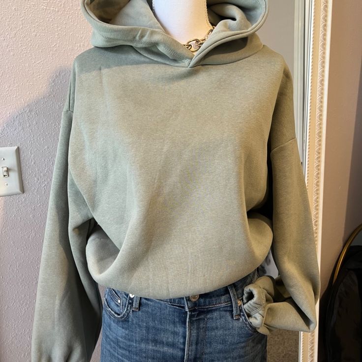 Nwot Sage Green Hoodie From Zara Elastic Waist And Cuffs Size Large Very Soft And Comfy, Lovely Color! Basic Fall Hoodie With Adjustable Hood, Basic Hoodie With Adjustable Hood For Fall, Oversized Khaki Hooded Hoodie, Basic Winter Hoodie Sweater, Basic Fall Hoodie With Ribbed Cuffs, Basic Fall Hoodie For Loungewear, Basic Hooded Winter Sweater, Basic Fall Loungewear Hoodie, Khaki Long Sleeve Hoodie For Spring