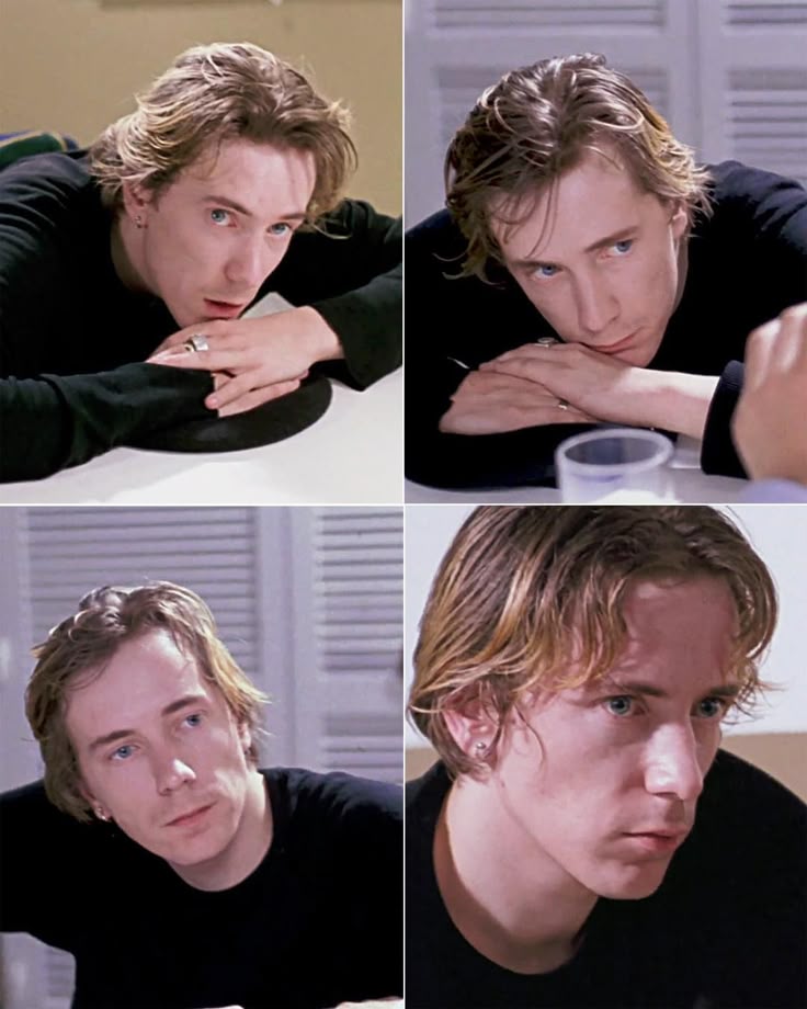 four different shots of a man sitting at a table with his hand on his chin