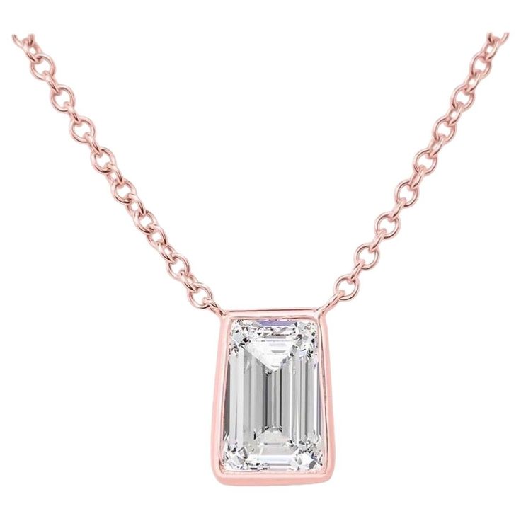 This stunning pendant necklace set in Italian hand made rose gold setting featuring a charming tapered Asscher cut diamond, weighing 1.02 carats. E color VS1 clarity. The incredible craftsmanship not often found on pendants this size has the pendant finely suspended from a fine delicate chain, thus ensuring it to sit perfectly This magnificent pendant is the epitome of minimalist perfection. chic, fashion ,perfection. Viewings available in our NYC wholesale office by appointment. please contact Asscher Cut Diamond, Asscher Cut, Diamond Pendant Necklace, Gold Set, Diamond Pendant, Or Rose, Necklace Set, Dog Tag Necklace, Jewelry Necklace Pendant