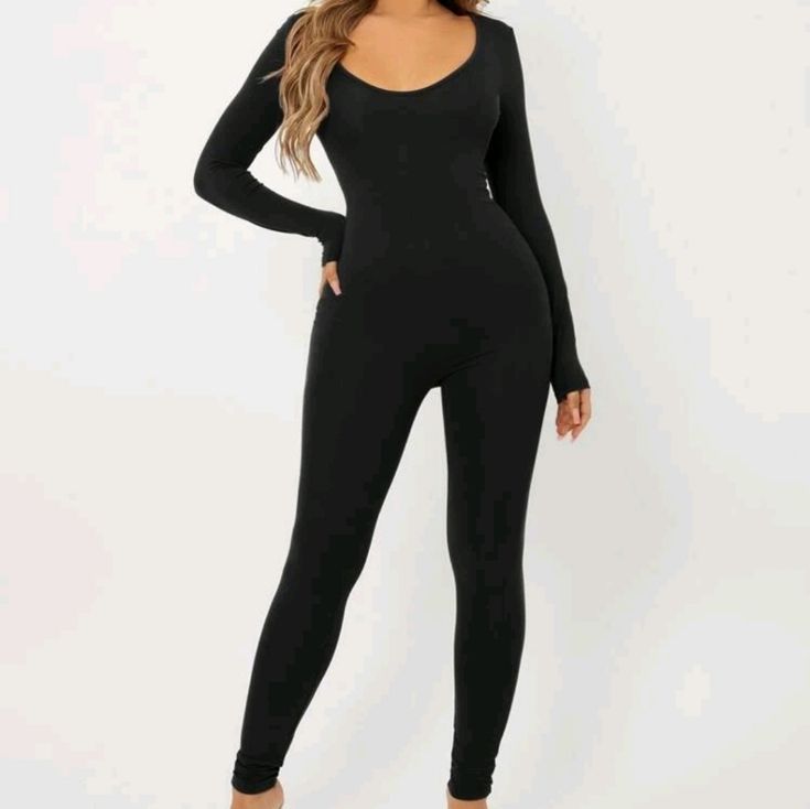 Scoop Neck Leotard Jumpsuit Stretch One-piece Bodysuit For Loungewear, Trendy Black Bodysuit With Thumbholes, Black Fitted One-piece Jumpsuit, Fitted One-piece Bodysuit For Loungewear, Black Fitted Jumpsuits And Rompers, Black Fitted One-piece Jumpsuits And Rompers, Black Fitted Full Length Jumpsuits And Rompers, Black Stretch Full-length Bodysuit, Black Stretch Leotard With Scoop Neck