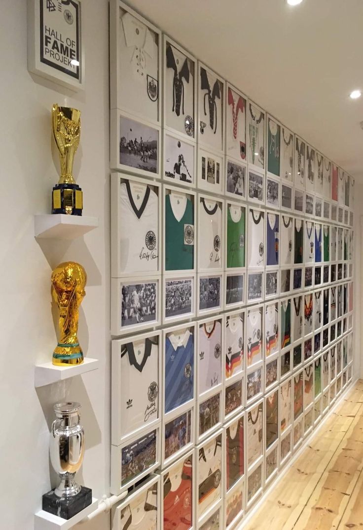 there are many trophies on the wall in this room