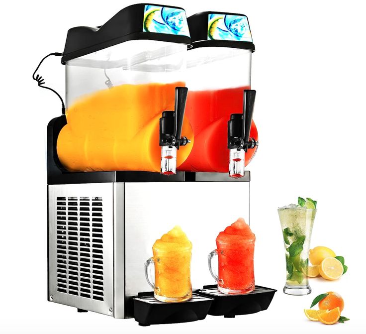 a machine that is filled with drinks next to some lemons and oranges on the table