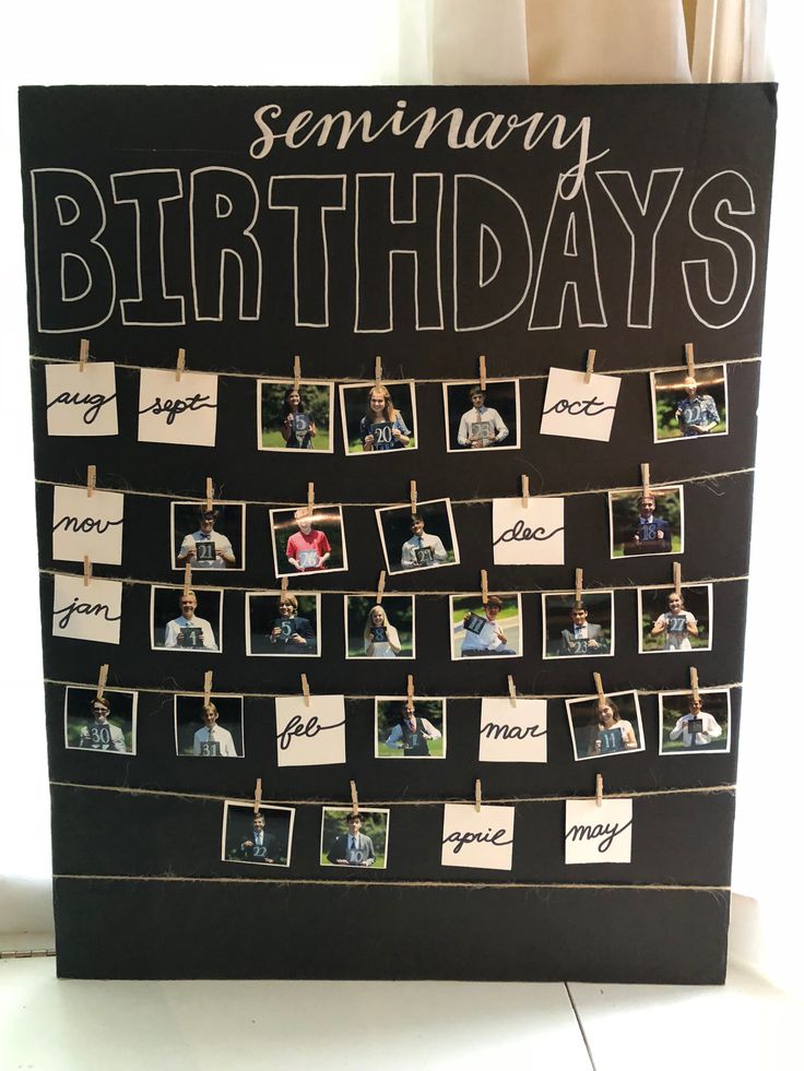 a birthday card with pictures hanging on clothes pins