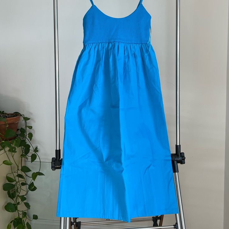 Midi Dress With Spaghetti Straps Blue Sundress With Adjustable Straps For Spring, Summer Light Blue Cotton Midi Dress, Blue Maxi Dress With Adjustable Straps, Light Blue Midi Length Sundress, Blue Sundress With Adjustable Straps For Day Out, Light Blue Cotton Sundress Midi Dress, Light Blue Cotton Midi Sundress, Cotton Midi Dress With Spaghetti Straps For Brunch, Light Blue Cotton Midi Dress For Beach