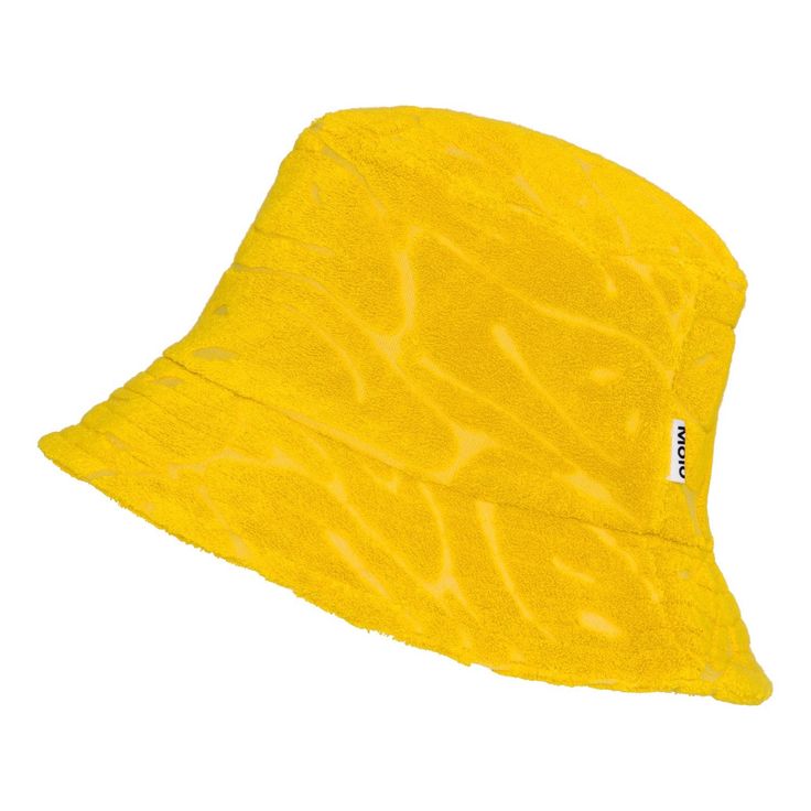 A textured hat with an abstract happy face design! Bring on the summer vibes with this Molo Yellow Summer Bucket Hat! Made from a soft cotton blend terry, this stylish and functional hat features a turned down brim for added comfort. Stay cool and stylish all summer long with this must-have accessory. Take a look at the rest of our Molo Collection here Details: 80% Cotton Terry, 20% Polyester Wash cold, inside out. No bleach or softener. Hang Dry. Iron inside out. This Molo product is GOTS certified organic, which means that it is made with certified organic materials and produced under the strictest social and environmental standards throughout the entire manufacturing process. In addition, the GOTS certification secures that the product is free of hazardous chemicals. Textured Hat, Yellow Bucket Hat, Summer Bucket Hat, Baby Sunglasses, Diaper Bag Accessories, Native Shoes, Summer Yellow, Mini Melissa, Organic Materials