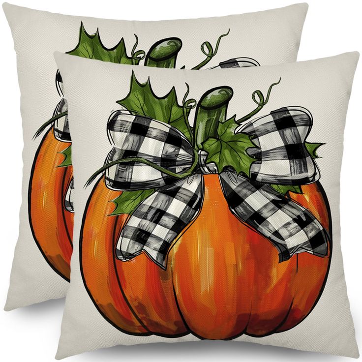 two decorative pumpkins with bows on them are featured in this pillow cover set, which is both white and black