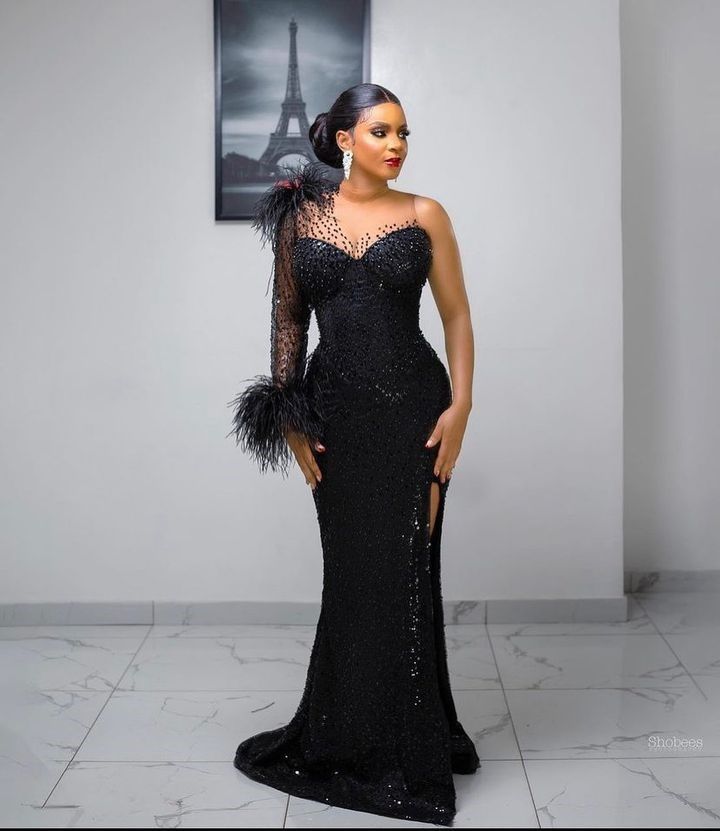 Asoebi style Sequence Asoebi Styles, Styles For Lace Gown Asoebi 2023, Lace Gown Styles Aso Ebi 2023, Black Owambe Styles, Law Dinner Dresses, Styles For Sequence Gown, Black Lace Styles Nigeria, Black Dinner Gown Styles, Law Dinner Gowns