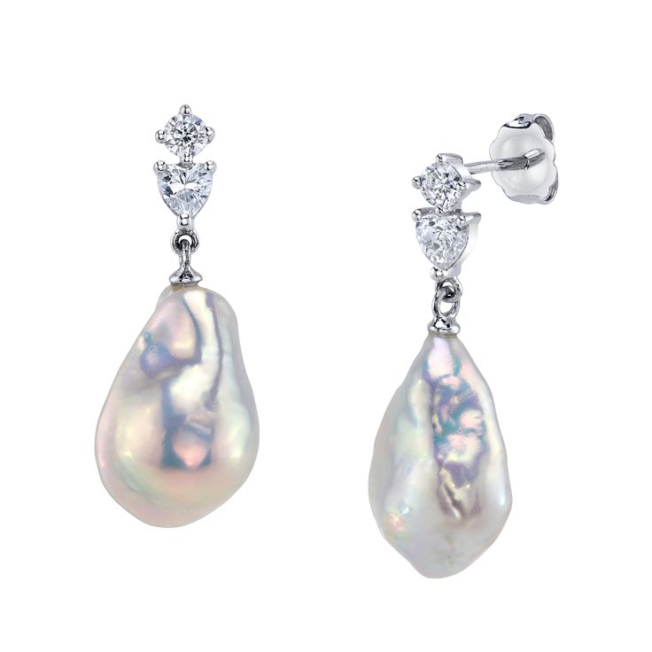 These exquisite pearl earrings add a touch of elegance to any occasion. These earrings feature two lustrous 11-12mm AAA quality Baroque White Freshwater pearls and white cz, hand picked for their gorgeous luster. The pearls are mountings on a sterling silver dangling base. Luxury Briolette Pearl Drop Earrings, Luxury Pear-shaped Pearl Drop Diamond Earrings, Formal Briolette Earrings With High Luster, High Luster Briolette Earrings For Formal Occasions, Formal High Luster Briolette Earrings, Luxury Pear-shaped Pearl Earrings, Luxury Pear-shaped Pearl Drop Bridal Earrings, Pear-shaped Pearl Charm Earrings For Anniversary, Pearl White High Luster Pear Shaped Pearl Earrings