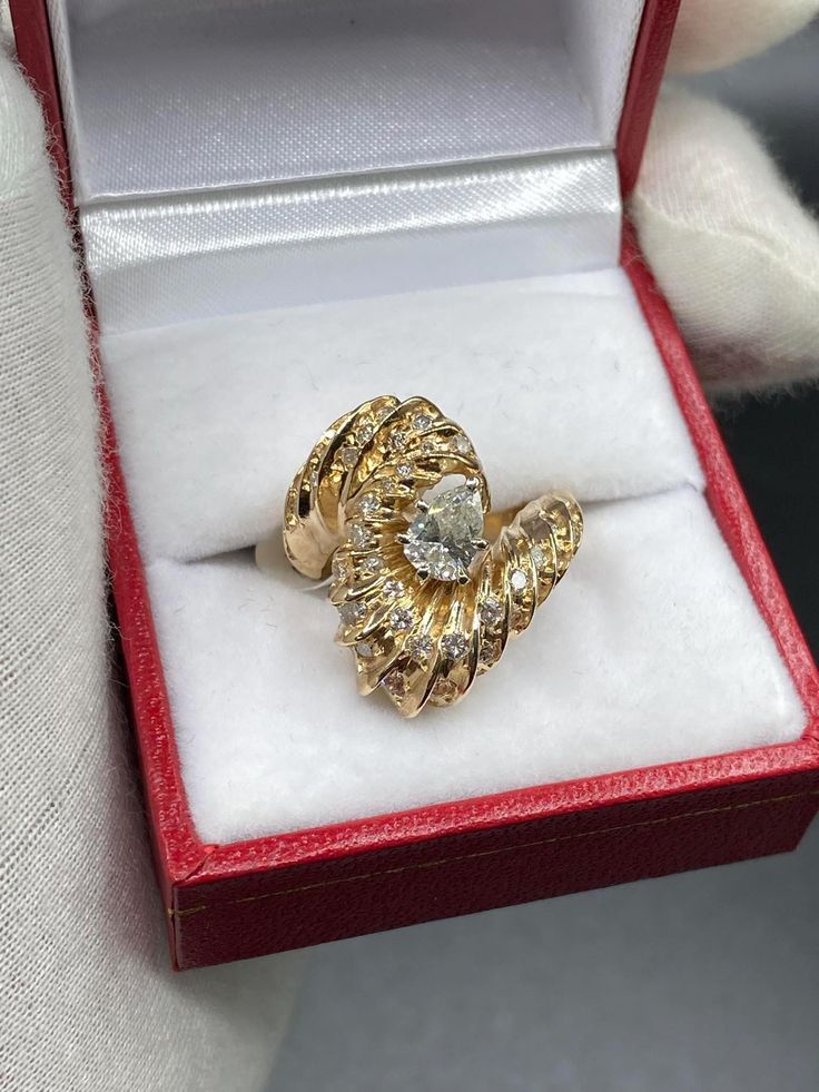 14K YELLOW GOLD DIAMOND RING, CENTRE 💎 = 0.55 CT,  40 ROUND 💎 = 1.17 CT,  TOTAL CW= 1.72 CT COMES WITH APPRAISAL  WE OFFER RING RESIZING, JEWELRY REPAIR, CLEANING IN STORE. When you purchase we will clean and polish the jewelry before we send. We do offer resizing of rings just in case if you find any ring on our profile that needs to be resized according to your need, feel free to ask about resizing. We do half size up for free. for etsy: description  We sell only real gold (white gold/ yello Collectible 14k Gold Diamond Ring, Collectible Yellow Gold Brilliant Cut Diamond Ring, Collectible Brilliant Cut Yellow Gold Diamond Ring, Pear-shaped Gold Cluster Diamond Ring, Heirloom Yellow Gold Diamond Ring Collectible, Heirloom Yellow Gold Diamond Ring, Collectible, Heirloom Yellow Gold Rings For Anniversary, Gold Pear-shaped Brilliant Cut Diamond Ring, Pear-shaped 14k Yellow Gold Diamond Ring