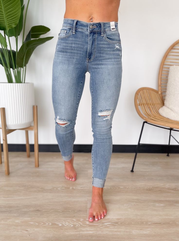 You will style comfortable and trendy all season long in the Maddie Jeans by Judy Blue! Features distressed detailing and rolled hemlines for a stylish and edgy look. They also feature a medium wash with a high-rise waistband and a zip and button closure. Perfect to pair with sweaters, blouses and tank tops! High Rise Light Wash Jeans With Zipper Closure, Light Wash High Rise Jeans With Zipper Closure, Everyday Ripped Washed Blue Bottoms, Medium Wash Bottoms With Zipper Closure For Fall, Fall Medium Wash Bottoms With Zipper Closure, Light Wash Jeans With Zipper Closure For Fall, Fall Light Wash Jeans With Zipper Closure, High Rise Medium Wash Bottoms With Zipper Closure, High Rise Bottoms With Zipper Closure In Medium Wash