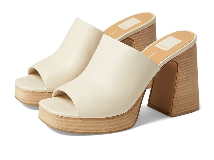 Modern Mules With Textured Footbed For Spring, Spring Mules With Removable Insole And Open Heel, Spring Open Heel Mules With Removable Insole, Casual Sandals With Stacked Heel For Day Out, Chic White Everyday Sandals, Leather Sandals For Everyday Spring Wear, Casual Beige Sandals With Wooden Heel, Beige Casual Sandals With Stacked Heel, Chic Heels With Textured Footbed