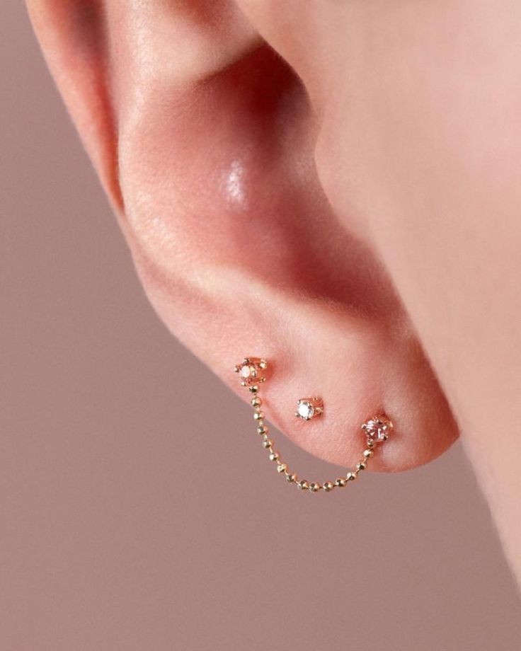 A teeny tiny 14k yellow gold stud with a 1.6mm white diamond. Handmade by Becca Mapes in her Brooklyn, NY studio. – 4-prong setting Dainty Yellow Gold Diamond Piercings, Elegant Tiny 14k Gold Piercings, Minimalist 14k Gold Piercings With Single Diamond, Minimalist 14k Gold Piercing With Single Diamond, Dainty Yellow Gold Piercings With Single Diamond, Delicate Yellow Gold Piercings For Everyday, Delicate Yellow Gold Everyday Piercings, Minimalist Yellow Gold Piercings With Prong Setting, Delicate 14k Yellow Gold Piercings