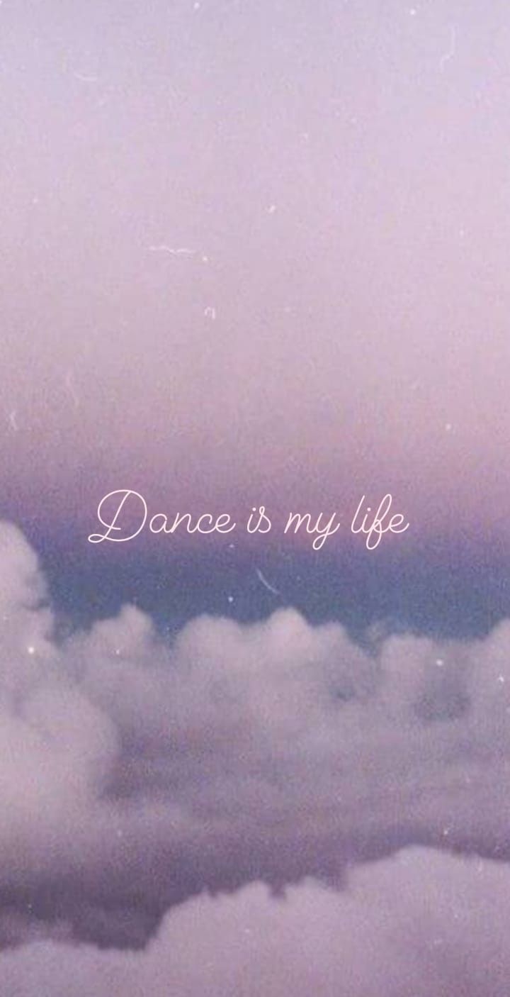 the words dance is my life are above clouds