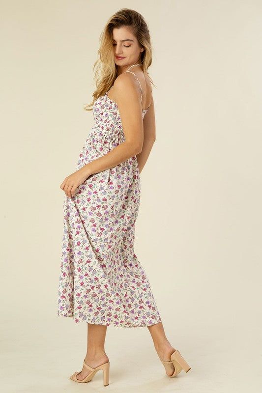 Floral smocked cami maxi dress. Model is 5' 7" and wearing size Small Recommended Sizing. 2-4 S, 6 M, 8-10 L Summer Cotton Smocked Dress With Floral Print, Feminine Summer Maxi Dress With Elastic Waistband, Ditsy Floral Print Maxi Sundress For Day Out, Maxi Length Ditsy Floral Sundress For Day Out, Spring Maxi Dress With Elastic Waistband For Garden Party, Spring Daywear Maxi Dress With Ditsy Floral Print, Spring Maxi Dress With Ditsy Floral Print For Daywear, Spring Floral Sundress With Smocked Back, Casual Smocked Dress With Adjustable Straps