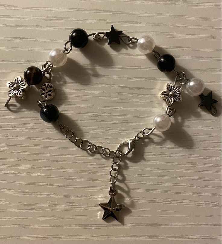 black white glass beaded bracelet Black Braclet Aesthetic, Black Braclet Ideas, Black Bracelets Aesthetic, Grunge Jewelry Bracelets, Black Bracelet Aesthetic, Black Bracelet Ideas, Red Bracelet Diy, Grunge Bracelets, Black And White Bracelets