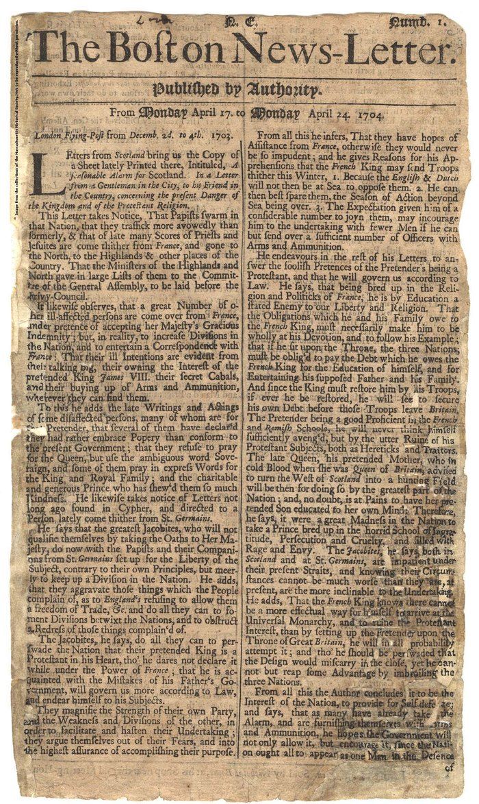 an old newspaper page with some writing on it