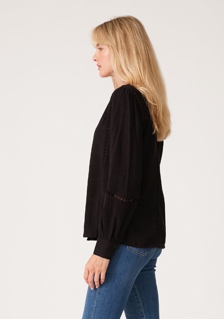 A timeless linen blend bohemian blouse with delicate crochet trim. FINAL SALE Linen blend Crochet-trim Voluminous long sleeve Self-covered button wrist cuff Ruffled neckline Self-covered button-up front Bohemian shirt Delicate crochet trim elevates this essential bohemian blouse. Designed in a cool linen blend, with voluminous long sleeves, a delicate self-covered button front, and a flattering flowy fit. Tuck it into your favorite vintage denim for a classic California boho feel. Model is 5'9, Fall Peasant Top With Smocked Cuffs And Long Sleeves, Fall Long Sleeve Peasant Top With Smocked Cuffs, Bohemian Long Sleeve Blouse For Work, Elegant Long Sleeve Tops With Crochet Trim, Casual Fall Blouse With Crochet Trim, Casual Blouse With Crochet Trim For Fall, Casual Crochet Trim Blouse For Fall, Cotton Top With Crochet Trim And Long Sleeves, Cotton Tops With Crochet Trim And Long Sleeves