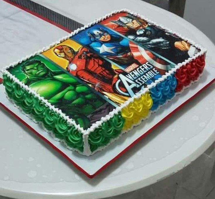 the cake is decorated with an image of avengers and captain america on it's side