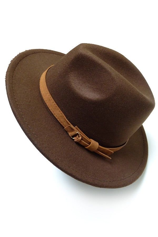 A vintage classic fedora hat with brown tie trim. You can never go wrong with a statement fedora hat, the perfect finishing touch, inspired by vintage men's styles, this hat is designed to make a statement. A trendy, fedora silhouette with a high crown, a tear-shaped crown brown tie trim.DIMENSION:Height: 4.75"Brim: 2.75"Circumference: 22"Material: 65% cotton, 35% Polyester Vintage Men Style, Pom Pom Beanie Hat, Brown Tie, Sunglass Chain, Shoe Gifts, Felt Hat, Steel Necklace, Fedora Hat, Monogram Initials