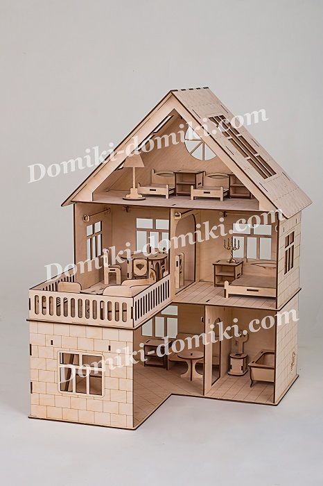 a wooden model of a house on a white background