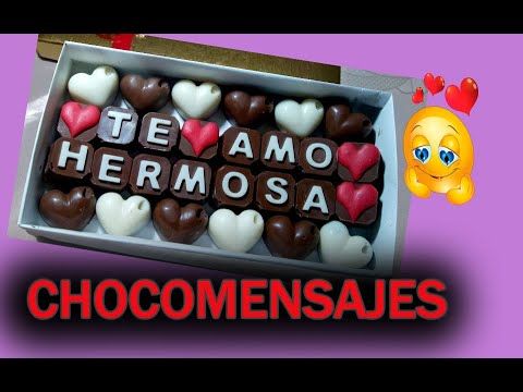 chocolates in a box with the words chocomensales written on them and an emoticive smiley face