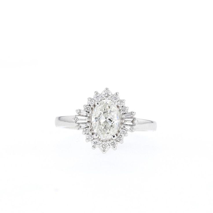 Winslow – Olive Avenue Jewelry Classic Marquise Halo Ring, Heirloom Oval Cluster Ring With Halo, Timeless Oval Diamond Ring With Halo, Classic Halo Ring With Baguette Cut, Classic Baguette Cut Halo Ring, Classic Marquise Diamond Halo Ring, Timeless Oval Halo Diamond Ring, Heirloom Oval Halo Cluster Ring, Heirloom Oval Halo Ring In Diamond White