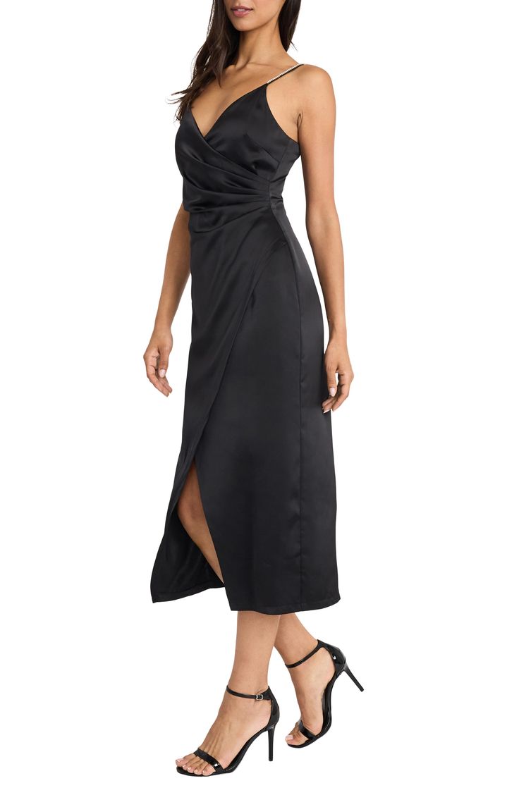 This figure-flaunting midi dress fashioned with a faux wrap front is topped with rhinestone adorned straps for a show-stopping look. 40 1/4" length (size Small) V-neck Spaghetti straps Lined 98% polyester, 2% spandex Dry clean Imported Dressy Draped Midi Dress For Night Out, Black Midi Dress With Surplice Neckline For Cocktail, Spring Faux Wrap Dress For Night Out, Faux Wrap Dresses For Night Out In Spring, Faux Wrap Dresses For Spring Night Out, Chic Faux Wrap Midi Dress For Night Out, Evening Faux Wrap Draped Dresses, Evening Draped Faux Wrap Dresses, Cocktail Faux Wrap Dress