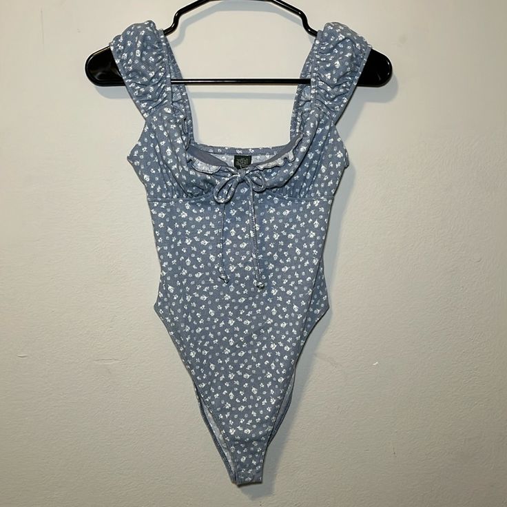 Floral One Piece Stretchy Xs New With Tags Cute Fitted Swimwear For Spring, Cute Blue Stretch Swimwear, Cute Stretch Blue Swimwear, Light Blue Sleeveless Swimwear For Spring, Light Blue Stretch Swimwear For Spring, Light Blue Sleeveless Casual Swimwear, Blue Fitted Casual Swimwear, Casual Blue Fitted Swimwear, Casual Fitted Blue Swimwear