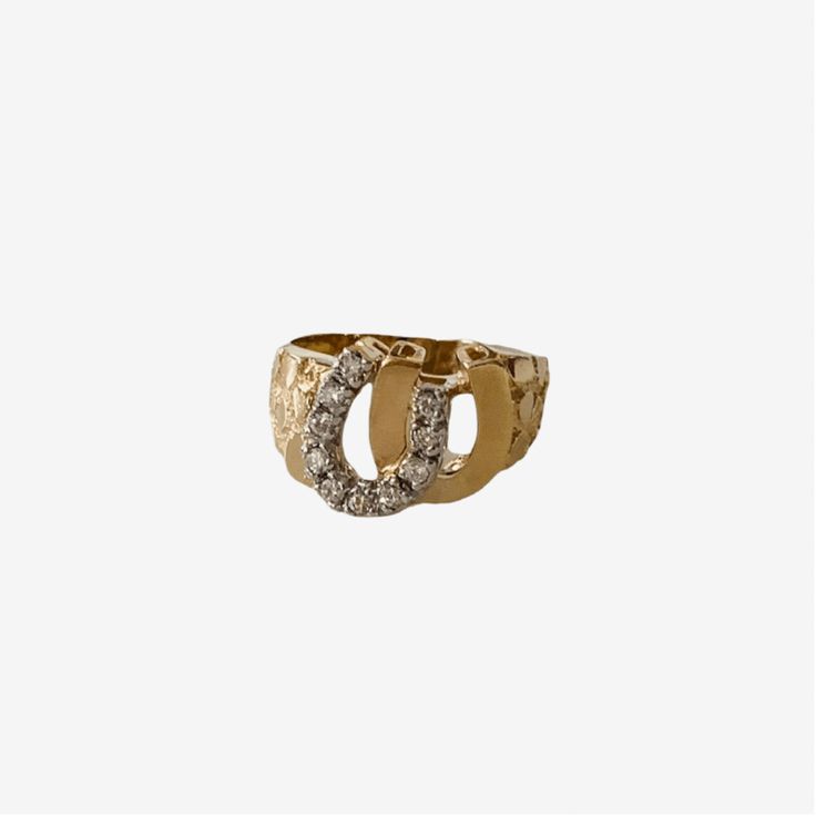 DOUBLE YOUR LUCK WHAT IT IS: 14k double gold horseshoe with diamond detail WHY IT'S SPECIAL: Horseshoes are an iconic addition to your ring stack, especially when they bring old-school vibes Buying vintage is always good for the environment GOOD TO KNOW: 14K Gold Diamonds 6.4 grams ﻿size 7 WHY WE LOVE RECREO: This collection of estate, vintage and antique rings from around the world delivers something unique and distinctive—we love being different. Plus buying vintage is always good for the envi Gold Horseshoe Diamond Jewelry, Gold Diamond Horseshoe Jewelry, Vintage Gold Horseshoe Jewelry, Diamond Horseshoe Ring For Anniversary, Horseshoe Diamond Ring For Anniversary, Classic Horseshoe Shaped Anniversary Rings, 14k Gold Horseshoe Ring, Elegant Gold Horseshoe Rings, Being Different