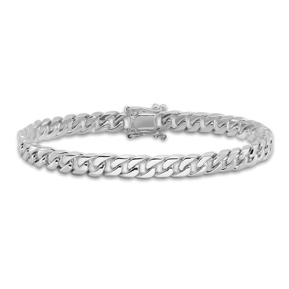 Versatile and stylish, bold solid curb links join together to form this handsome 6.8mm men's bracelet. Crafted in 14K white gold, the 8-inch curb chain secures in place with a box clasp. White Gold Cuban Link Bracelet With Solid Links, White Gold Cuban Link Bracelet, Classic White Gold Cuban Link Bracelet With Curb Chain, Classic White Gold Cuban Link Bracelet For Formal Occasions, Classic White Gold Cuban Link Bracelet For Formal Events, Classic White Gold Cuban Link Sterling Silver Bracelet, Classic Cuban Link Bracelet With Polished Finish, White Gold Cuban Link Bracelet With Curb Chain, Classic Cuban Link Chain Bracelet