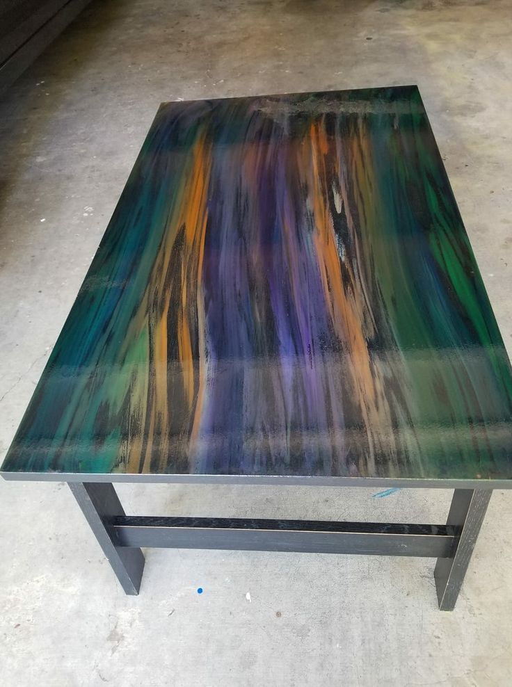 a table that has been painted with different colors