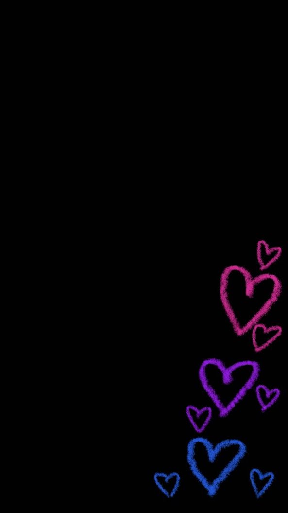 some hearts are drawn on a black background