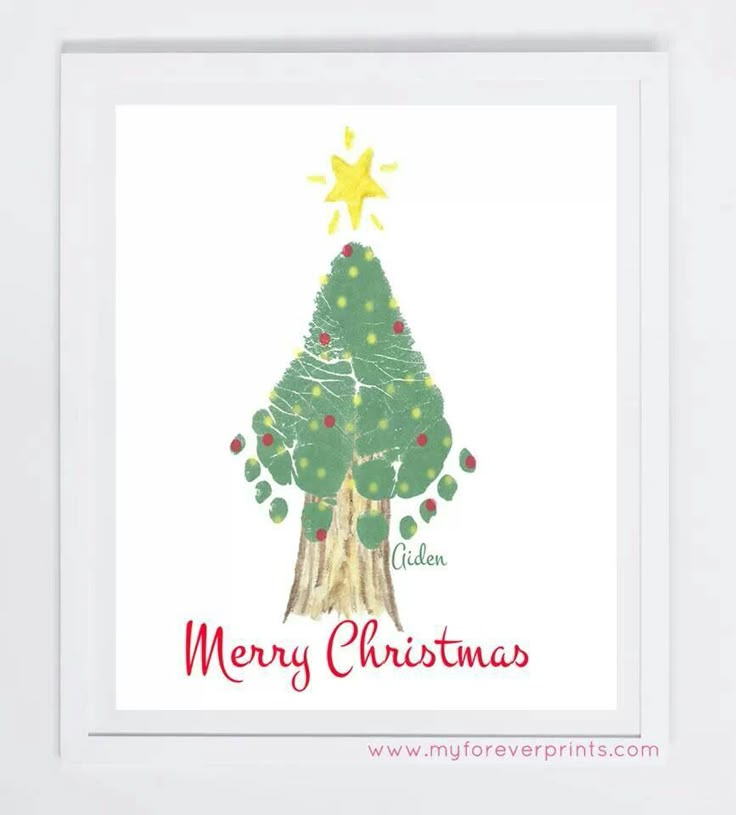 a christmas tree with the words merry christmas written on it in red and green lettering