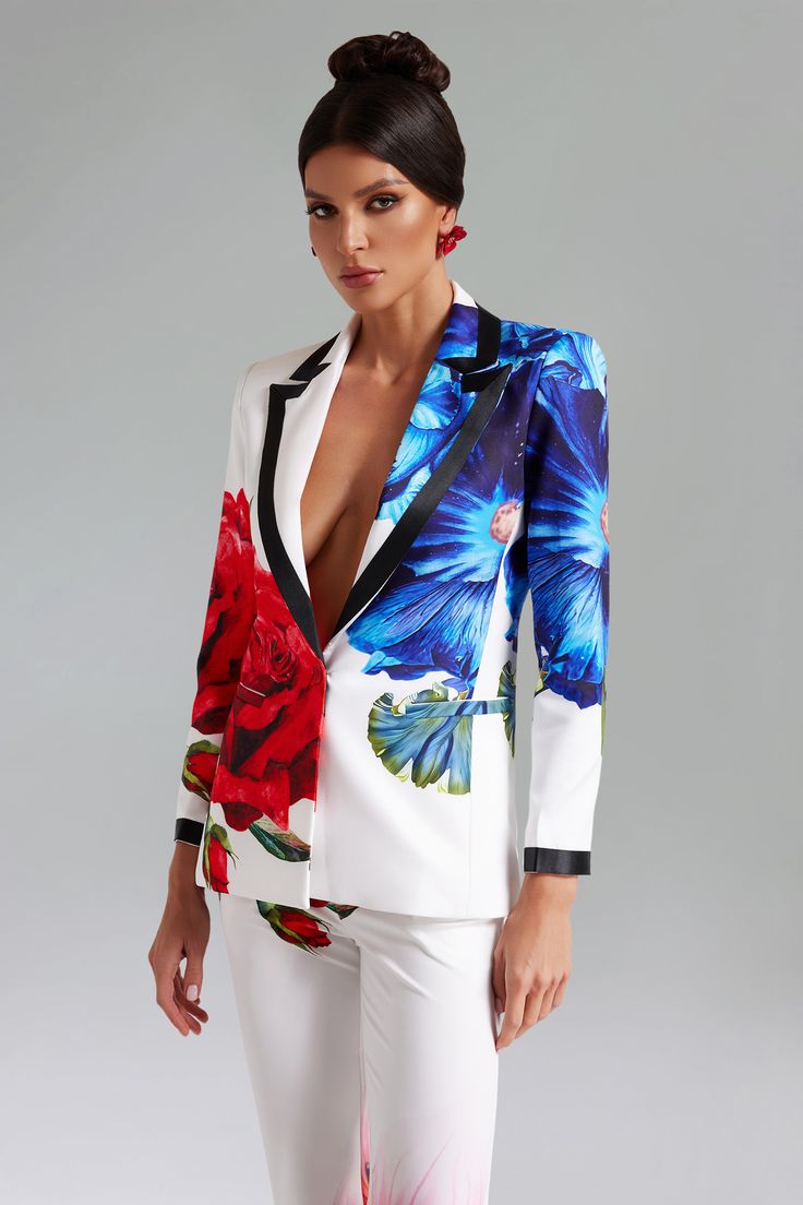 Showcase your unique style and personality with our Guga Floral Printed Blazer Set! This set blends a bold floral print with a tailored blazer design, creating a perfect balance of style and sophistication. Ideal for both work and social events, it can be easily accessorized with a simple clutch and subtle stud earrings for a polished look.    Model wearing size S  Model Stats:Height - 68.9”/175 cm Bust - 35.4”/90cm Hips - 36.6”/93 cm Waist - 25.5”/65 cm  Colour may vary Tailored Floral Print Elegant Blazer, Tailored Elegant Floral Print Blazer, Fitted Floral Print Blazer For Party, Formal Blazer With Floral Print, Elegant Fitted Floral Print Blazer, Elegant Formal Blazer With Floral Print, Elegant Multicolor Blazer With Notch Lapel, Elegant Multicolor Formal Blazer, Printed Notch Lapel Blazer For Work