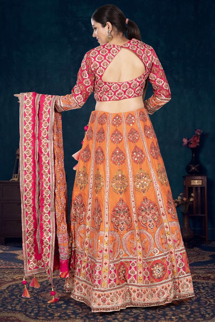 Shine on the dance floor with our Party Wear Lehenga D-340! This unique lehenga features a playful print and sparkly sequins, perfect for a night out. With full sleeves, you'll stay stylish and comfortable all evening long. Get ready to turn heads and have a blast! Anarkali Long Sleeve Choli With Cutdana, Multicolor Long Sleeve Anarkali Set For Navratri, Long Sleeve Anarkali Set With Mirror Work For Festivals, Festive Anarkali Choli With Long Sleeves, Sharara With Dupatta And Long Sleeves For Festivals, Long Sleeve Sharara With Dupatta For Festivals, Festival Long Sleeve Anarkali Set With Mirror Work, Long Sleeve Anarkali Set For Reception And Festivals, Long Sleeve Traditional Wear With Sequins For Navratri