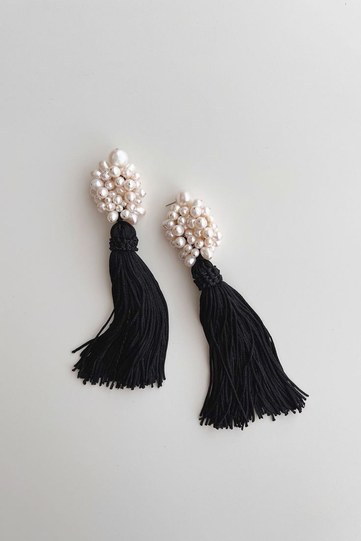 A major statement, veering on the line of old glamour and modern bohemia. The Grande Tassel Earrings, shown in noir, feature a medley of genuine freshwater pearls and black tassels set onto baroque pearl studs. Material: 14k gold filled or sterling silver Measures: 5 1/2" in length Heavier than a standard statement earring Closure: post earring Sold in Pairs Handmade in New York Arrives perfectly packaged, ready for gift-giving! Old Glamour, Affordable Fine Jewelry, Body Decor, Elizabeth Jewelry, Tassel Drop Earrings, Statement Earring, Bridal Necklace, Pearl Studs, Baroque Pearls